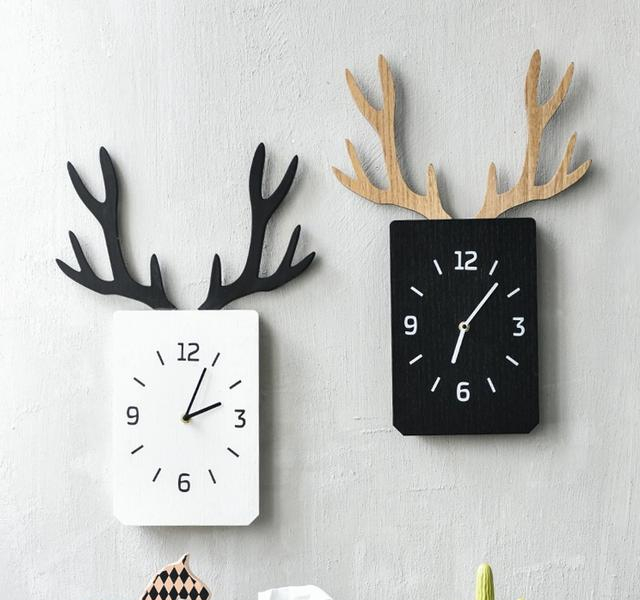 小小的创意挂钟设计 却能让够让单调墙面多点艺术气息