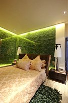 简约卧室绿色床头背景墙效果图