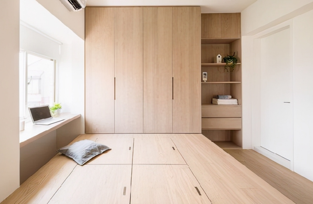 床尾空间利用设计 小卧室可以用一块板增加功能区
