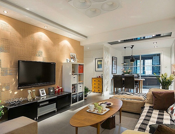 设计师以简单温暖的现代风格，加以修饰，让整个空间放