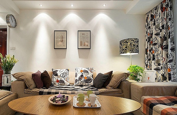 设计师以简单温暖的现代风格，加以修饰，让整个空间放