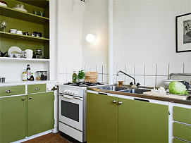 厨房的橱柜巧妙应用了绿色元素