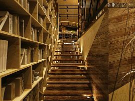 幾木咖啡館之樓梯旁書架裝修設(shè)計(jì)效果圖