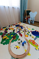 178㎡北欧现代三居之玩乐区地毯布置效果图