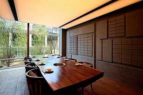 旬八日料餐厅用餐处座椅布置效果图